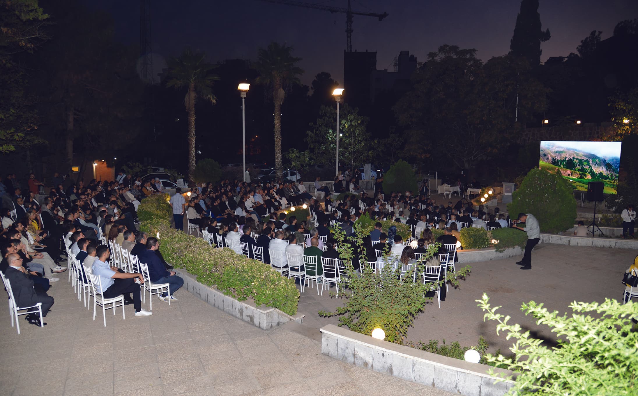 Audience at the 25th Memar Award ceremony outdoor garden venue