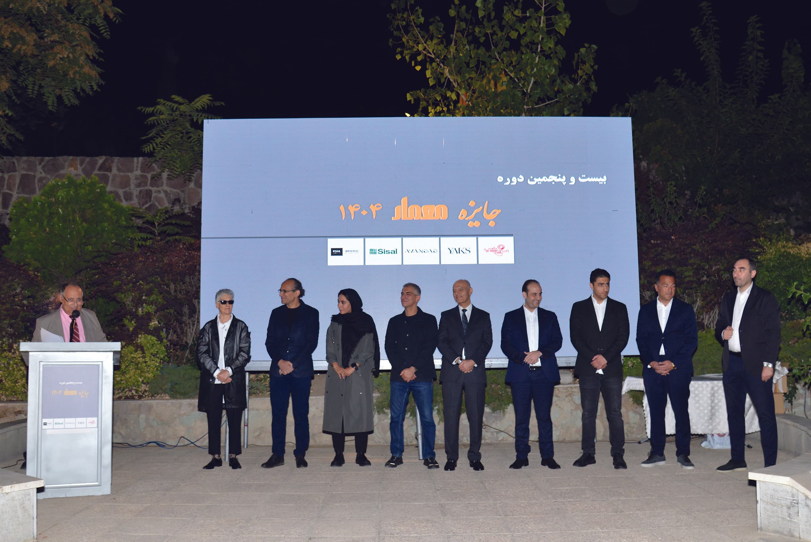 Winners on stage at the 25th Memar Award ceremony with sponsor backdrop