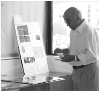 Juror Faramarz Sharifi reviewing submissions during the 6th Memar Award jury sessions