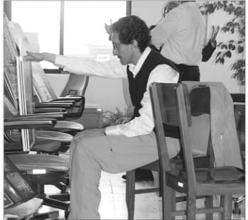 Juror Firouz Firouz reviewing submissions during the 6th Memar Award jury sessions